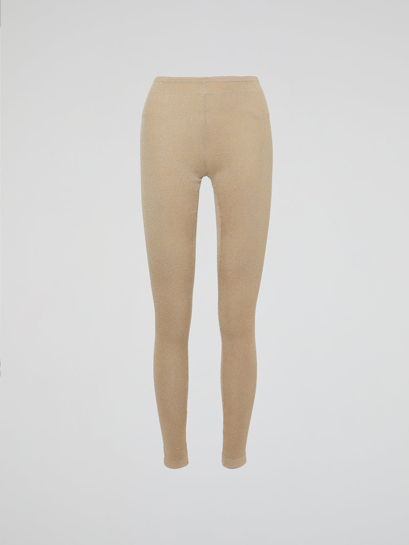 Wrap your legs in luxurious comfort and style with our Beige Knitted Leggings by Roberto Cavalli. Made from the finest quality fabrics, these leggings are expertly designed to provide a seamless fit that sculpts and contours your silhouette flawlessly. Whether you're lounging at home or stepping out for a night on the town, these leggings are the perfect blend of elegance and relaxation.