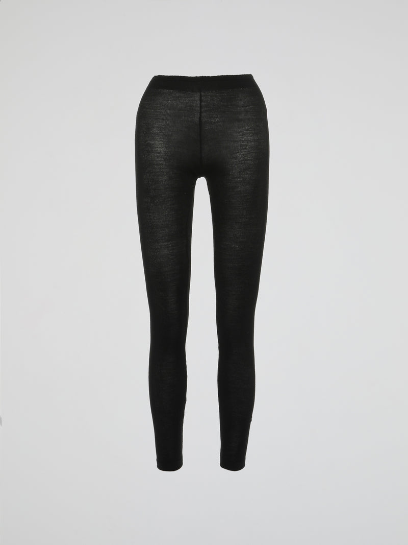 Introducing the epitome of luxurious comfort - the Black Knitted Leggings by Roberto Cavalli. Crafted with meticulous attention to detail, these leggings blend fashion-forward style with unmatched coziness. Perfect for lounging at home or turning heads on the street, these leggings are a versatile addition to your wardrobe that you won't be able to resist slipping into.