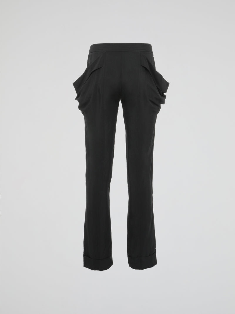 Step up your style game with these Grey Oversized Pocket Trousers by Roberto Cavalli. Crafted with the finest attention to detail, these trousers offer a perfect blend of sophistication and urban streetwear. The oversized pockets not only make a bold fashion statement, but also provide functionality for carrying all your essentials on the go.