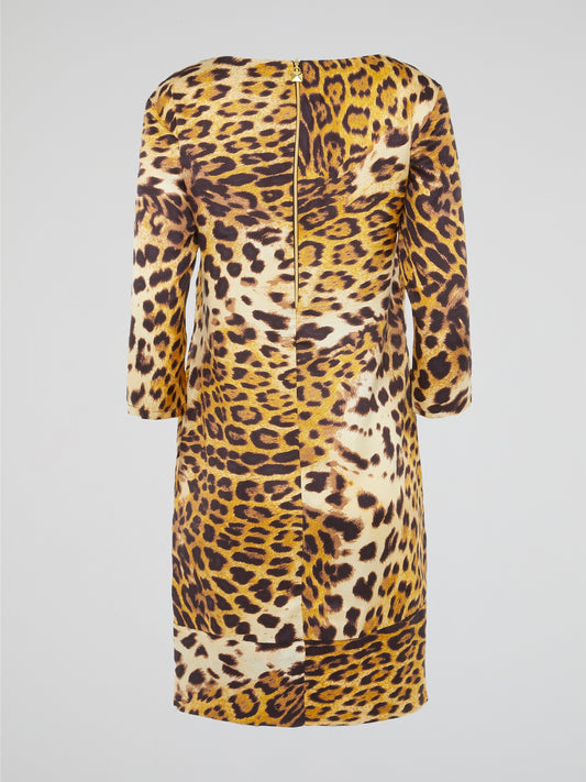 Release your inner wild side with the Yellow Leopard Print Dress by Clas Roberto Cavalli. Roaring with style, this dress boasts a fierce leopard print pattern in a striking yellow hue that is sure to turn heads. With its body-hugging silhouette and luxurious fabric, this dress is the perfect statement piece for any glamorous occasion.