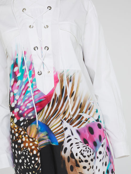 Elevate your wardrobe with the Abstract Print Lace Up Blouse from Roberto Cavalli - a bold and unique piece that exudes confidence and style. Featuring a stunning abstract print and eye-catching lace-up detailing, this blouse is sure to turn heads wherever you go. Make a statement and stand out from the crowd with this must-have addition to your closet.