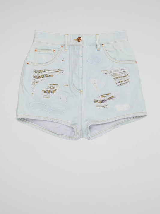 Embrace your inner rebel with our Blue Distressed Denim Shorts by Roberto Cavalli- perfect for any daring fashionista looking to make a statement. With a worn-in look and edgy vibes, these shorts are sure to turn heads wherever you go. From music festivals to beach days, these shorts are a must-have addition to your wardrobe for a bold and fearless style.