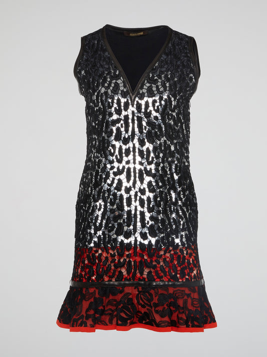 Indulge in the fierce elegance of the Roberto Cavalli Leopard Pattern Lace Overlay Dress. Embrace your wild side with the intricate lace detailing and bold leopard print design. Stand out from the crowd and unleash your inner fashionista with this show-stopping statement piece.