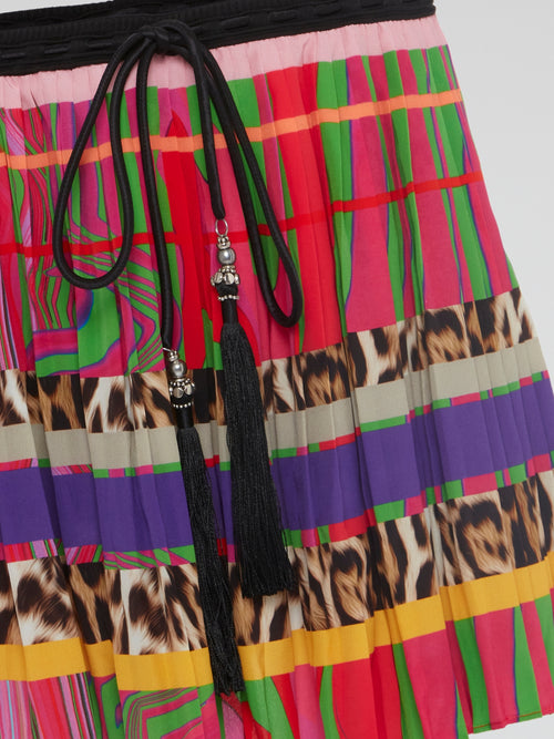 Turn heads with the bold and vibrant Printed Accordion Mini Skirt by Roberto Cavalli, a true fashion statement that will elevate any outfit. This striking skirt features a unique accordion pleat design and eye-catching print that exudes confidence and individuality. Embrace your inner fashionista and make a style statement with this must-have piece that is sure to spark conversations and turn Instagram likes into traffic.