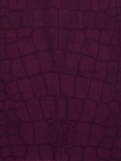 Wrap yourself in luxury with this stunning Burgundy Snake Print Scarf by Roberto Cavalli. Made from the finest materials, this scarf features a bold and captivating design that will elevate any outfit. Stand out from the crowd and exude confidence and style with this must-have accessory.