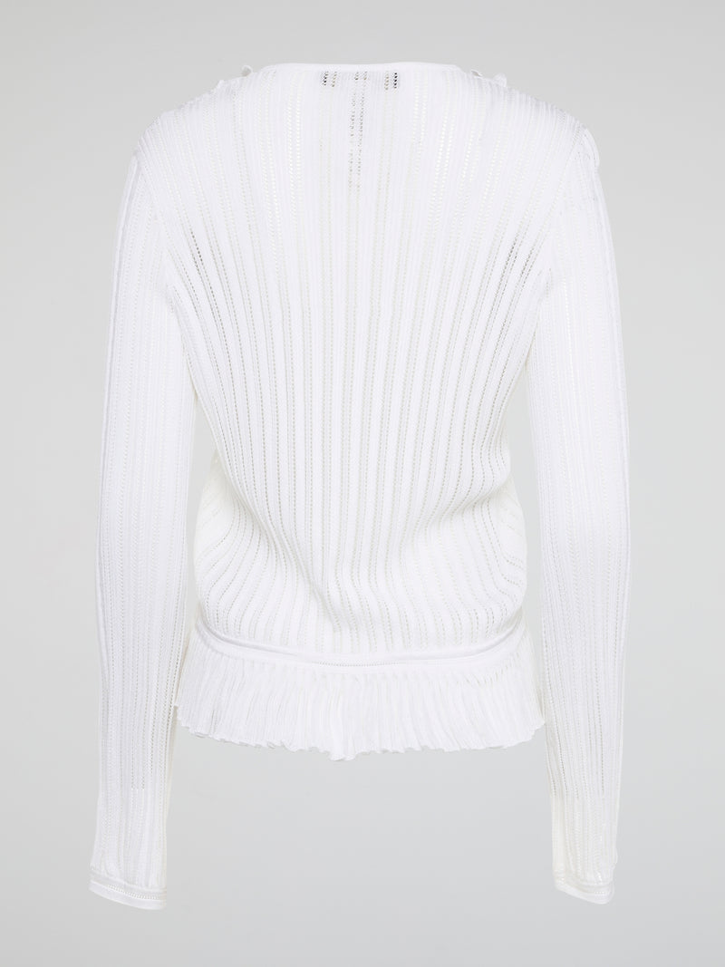 Elevate your wardrobe with the White Rib Knit Long Sleeve Top from Roberto Cavalli. Crafted with luxurious ribbed fabric, this top boasts a flattering silhouette and a timeless white hue perfect for any occasion. Embrace effortless elegance and make a statement with this must-have wardrobe staple.