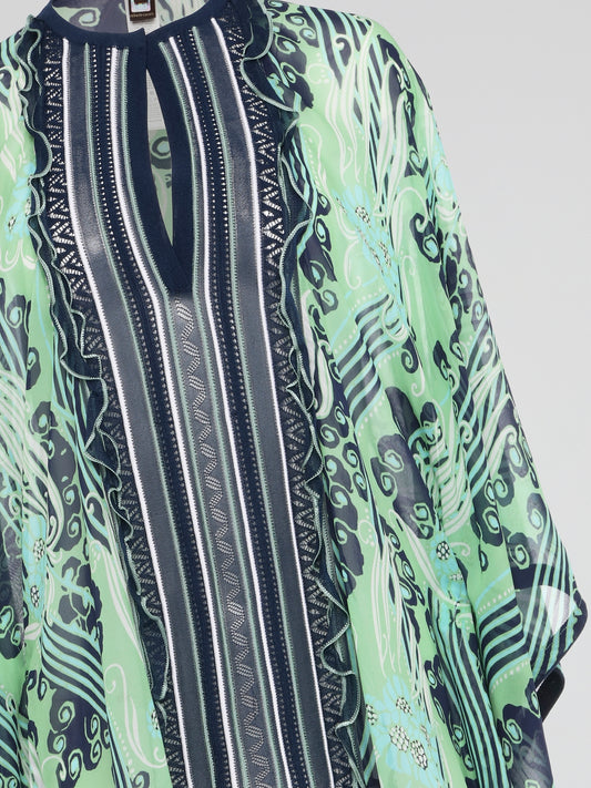 Adorn yourself in the vibrant colors and intricate patterns of our Tribal Print Keyhole Kaftan by Roberto Cavalli, a unique and eye-catching piece that effortlessly combines style and comfort. Feel the silky fabric drape elegantly over your skin as you slip into this kaftan, perfect for a day at the beach or a night out on the town. Make a statement and turn heads wherever you go with this must-have wardrobe staple.
