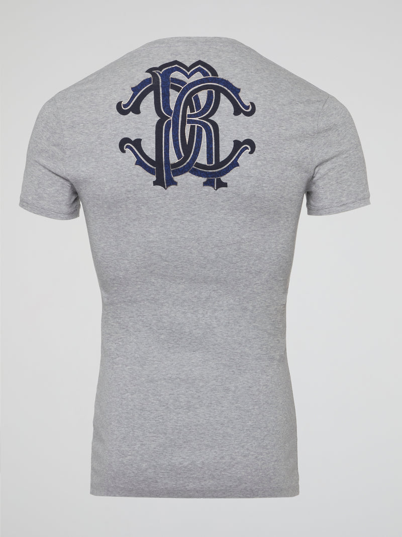 Elevate your casual wardrobe with the Grey Logo Print T-Shirt by Roberto Cavalli Underwear, a stylish statement piece that combines comfort and luxury effortlessly. Made with premium materials and featuring the iconic Roberto Cavalli logo prominently displayed, this t-shirt is a must-have for fashion-forward individuals looking to make a bold impression. Stand out from the crowd and showcase your impeccable taste with this eye-catching piece that is sure to turn heads wherever you go.