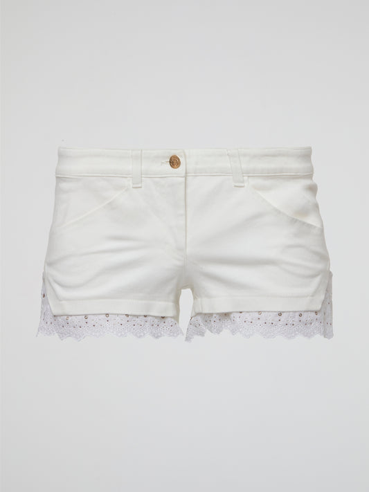 Embrace your inner bohemian goddess with these White Lace Trim Shorts by Roberto Cavalli. The delicate lace detailing adds a touch of elegance to these flowy shorts, perfect for a summer music festival or beach day. Channel your inner free spirit and stand out in style with this must-have addition to your wardrobe.