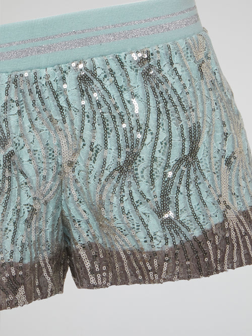 Get ready to sparkle and shine with these Sequin Detailed Shorts by Roberto Cavalli. Made for the bold and daring fashionista who isn't afraid to stand out from the crowd, these eye-catching shorts are perfect for a night out on the town or a special event. With intricate sequin detailing and a flattering fit, these shorts will have all eyes on you wherever you go.