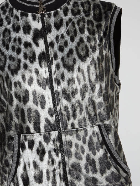 Unleash your wild side with this stunning Metallic Leopard Print Vest from Roberto Cavalli. Crafted with luxurious metallic detailing, this vest is the perfect statement piece for any fashion-forward individual looking to make a bold entrance. Stand out from the crowd and turn heads wherever you go with this fierce yet elegant addition to your wardrobe.