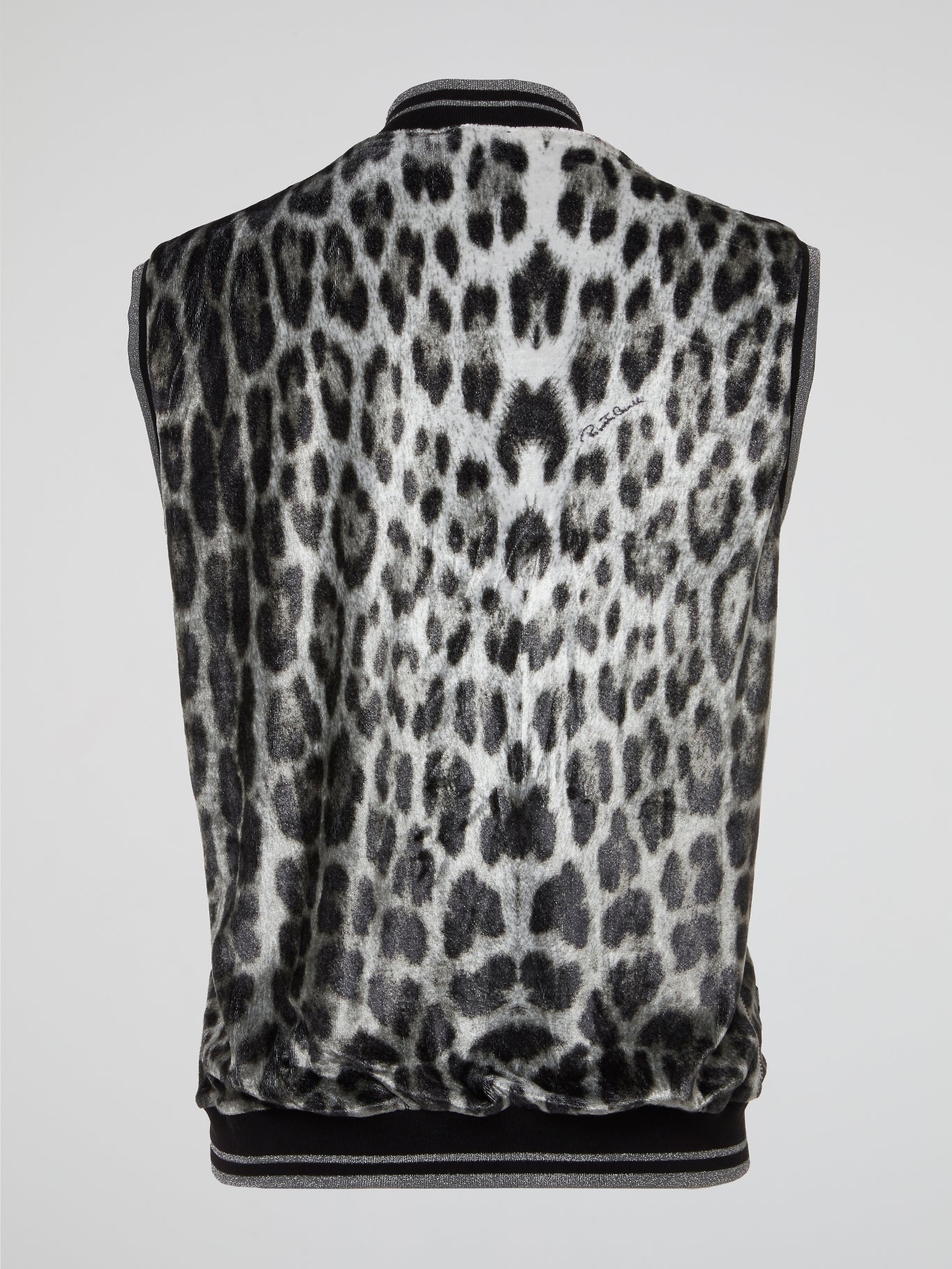 Unleash your wild side with this stunning Metallic Leopard Print Vest from Roberto Cavalli. Crafted with luxurious metallic detailing, this vest is the perfect statement piece for any fashion-forward individual looking to make a bold entrance. Stand out from the crowd and turn heads wherever you go with this fierce yet elegant addition to your wardrobe.