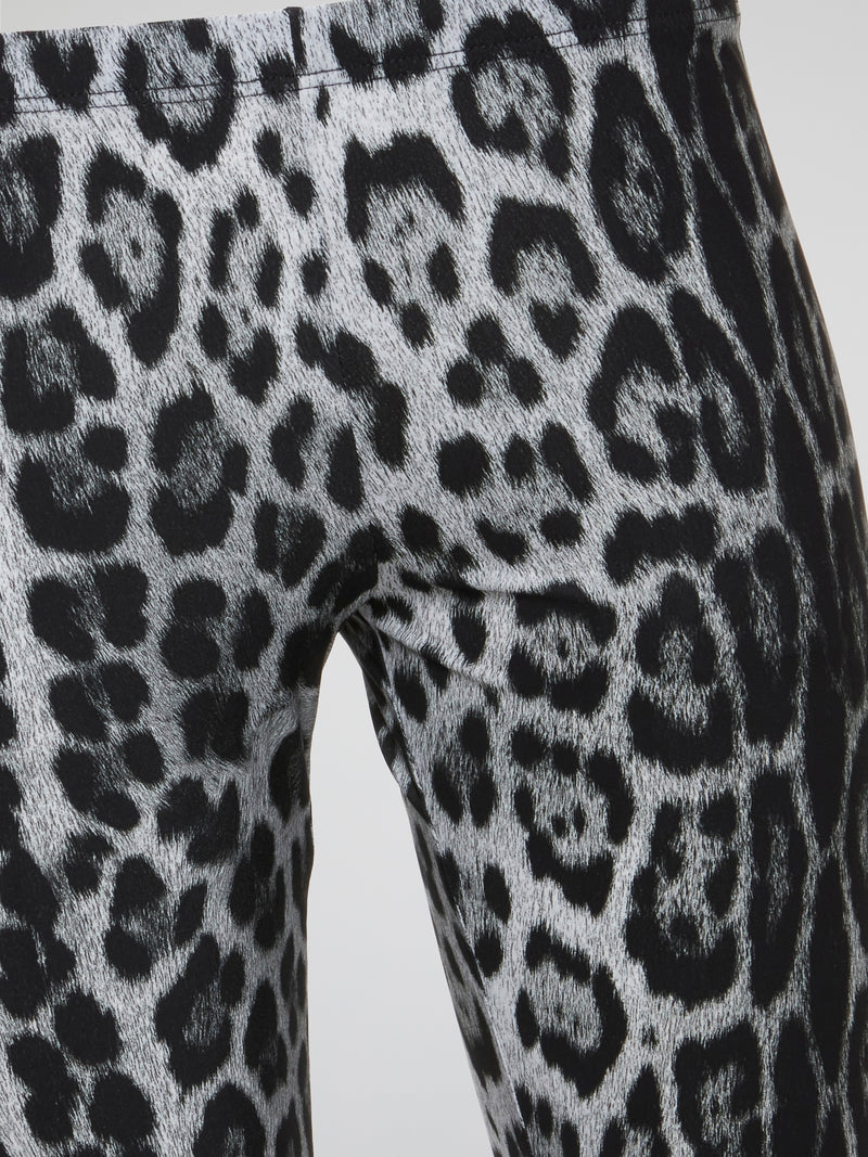 Unleash your wild side with these fierce Roberto Cavalli leopard print leggings that will add a touch of luxury to your everyday wardrobe. Made with high-quality materials and expert craftsmanship, these statement leggings are a must-have for trendsetters and fashion enthusiasts alike. Whether you're running errands or hitting the gym, stand out from the crowd and show off your unique style with these eye-catching leggings.