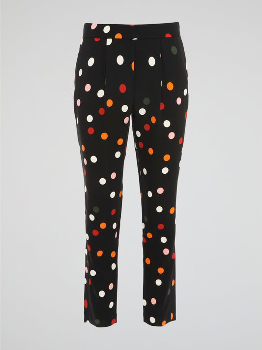 Step out in style with these Black Polka Dot Pleated Trousers from Akris Punto, a perfect blend of sophistication and playfulness. Crafted with meticulous attention to detail, these trousers feature a flattering pleated design that effortlessly elongates your silhouette. The whimsical polka dot pattern adds a touch of fun to your outfit, making these trousers a must-have for any fashion-forward individual.