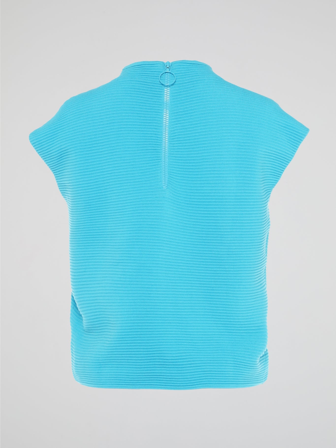 Step up your fashion game with the Blue Knitted Top by Akris Punto. Crafted with love and attention to detail, this unique piece combines comfort and style effortlessly. Its vibrant blue color and intricate knitted pattern will make you the center of attention wherever you go, leaving a lasting impression on everyone.