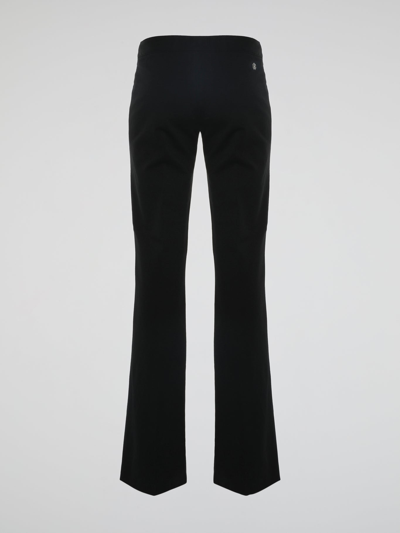 Step into the world of effortless glamour with these Black Flared Trousers by Roberto Cavalli. Crafted with meticulous precision, these trousers boast a striking silhouette that elegantly skims the figure, accentuating every curve. From the office to a night out, these trousers are a timeless wardrobe staple designed to make a bold fashion statement.