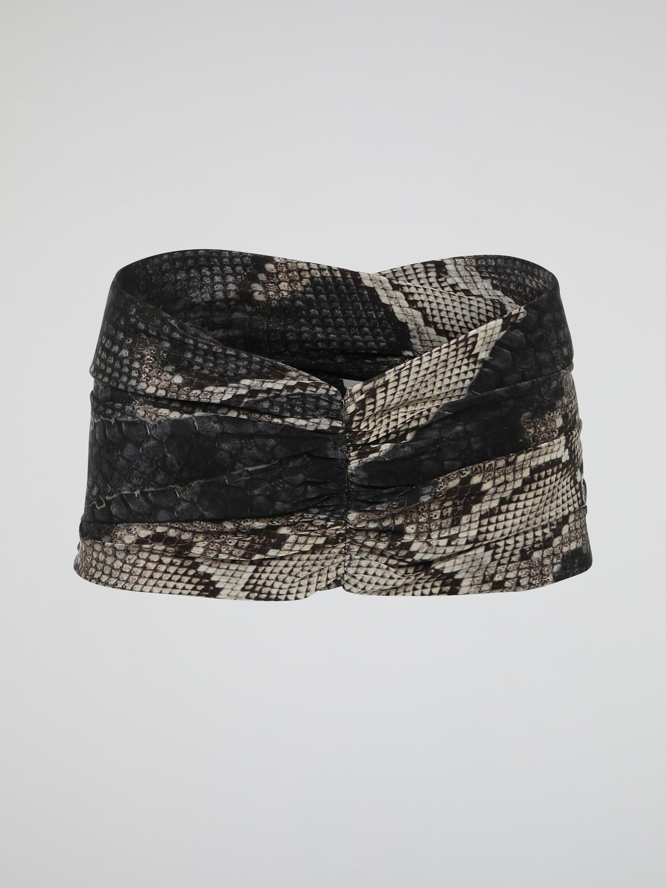 Add a touch of fierce elegance to your outfits with the mesmerizing Snake Print Belt from Roberto Cavalli. Crafted with meticulous attention to detail, this accessory combines edginess and sophistication effortlessly. Let the hypnotic pattern wrap around your waist, instantly transforming any ensemble into a show-stopping masterpiece.