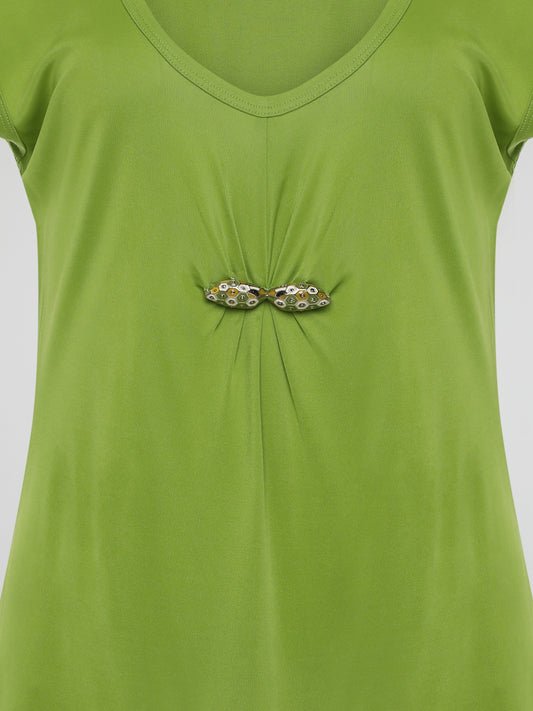 Introducing the Green Scoop Neck Top by Roberto Cavalli, where elegance meets sustainability! Crafted from luxurious eco-friendly materials, this chic piece boasts a flattering scoop neckline and a vibrant green hue that radiates freshness and life. Feel confident and fashion-forward, knowing that this Roberto Cavalli creation not only enhances your style, but also supports a greener future.