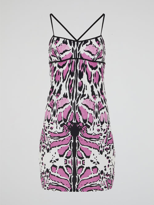 Unleash your wild side with the Animal Print Strap Dress by Roberto Cavalli. This captivating and daring dress features a mesmerizing print that evokes the untamed spirit of the jungle. The sleek and flattering silhouette, coupled with the luxurious fabric, makes it a fierce and fashionable choice for any occasion.