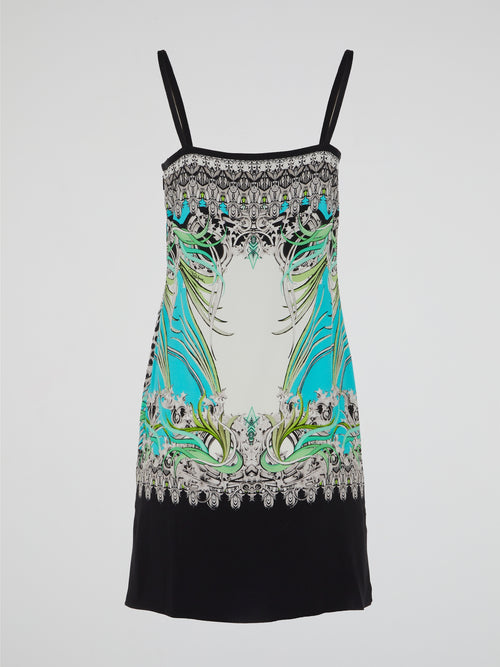 Step into the wild side of fashion with the Animal Print Strap Dress by iconic designer Roberto Cavalli. Inspired by the untamed beauty of the jungle, this stunning dress features a mesmerizing animal print that is sure to turn heads. Its flattering silhouette and delicate shoulder straps add a touch of elegance to this fierce and fearless ensemble.