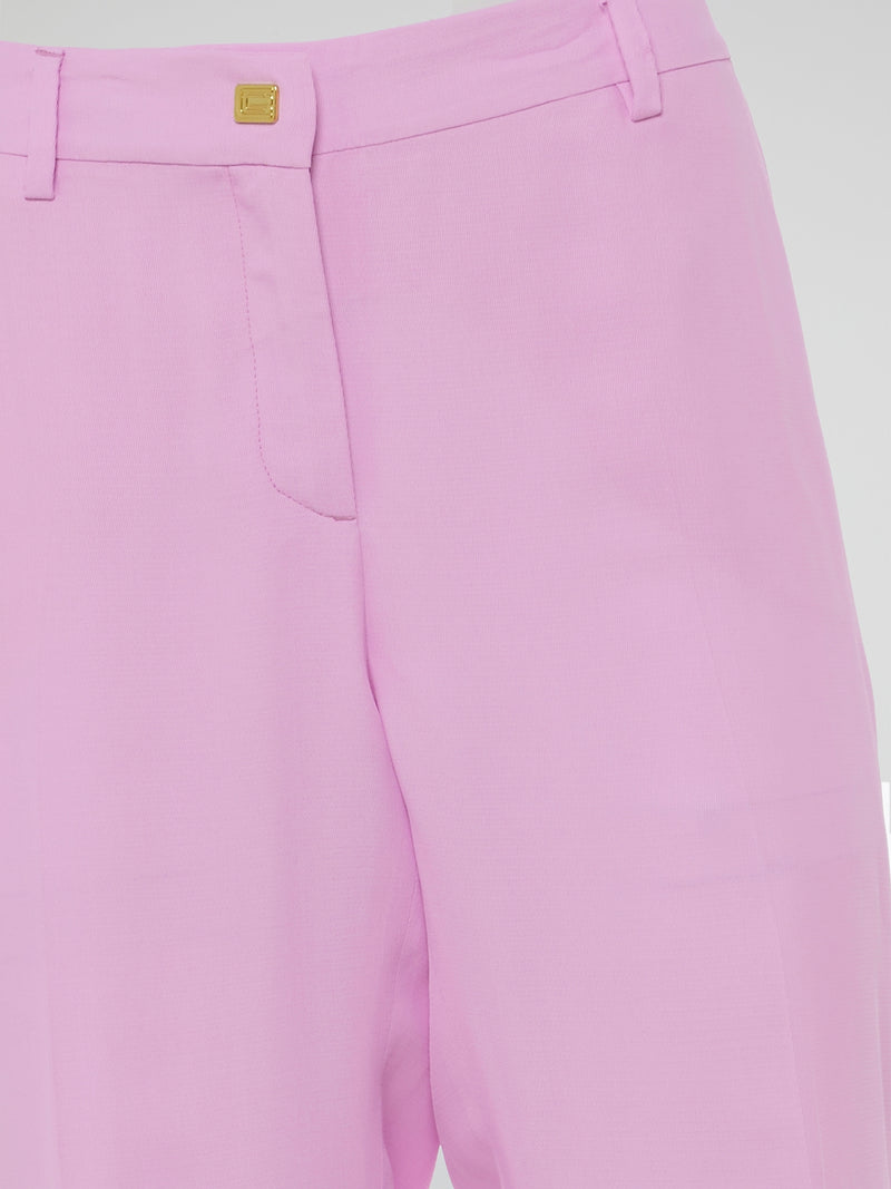 Step into the world of effortlessly chic fashion with Clas Roberto Cavalli's Pink Flared Trousers. These vibrant bottoms combine the perfect blend of style and comfort, ensuring you stand out from the crowd wherever you go. Whether paired with a tailored blazer or a casual crop top, these trousers are the ultimate symbol of confidence and femininity.