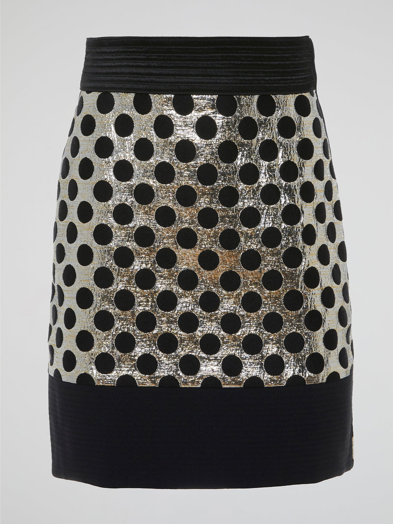 Introducing the Foil Panel Polka Dot Skirt by Emanuel Ungaro, a captivating blend of sophistication and playfulness. This cutting-edge skirt features exquisite foil panel accents that add a touch of glamour to the classic polka dot pattern, creating a truly unique and eye-catching design. Whether paired with a crisp blouse for a chic work ensemble or dressed up with a statement top for a night out, this skirt guarantees to turn heads and make a memorable fashion statement.