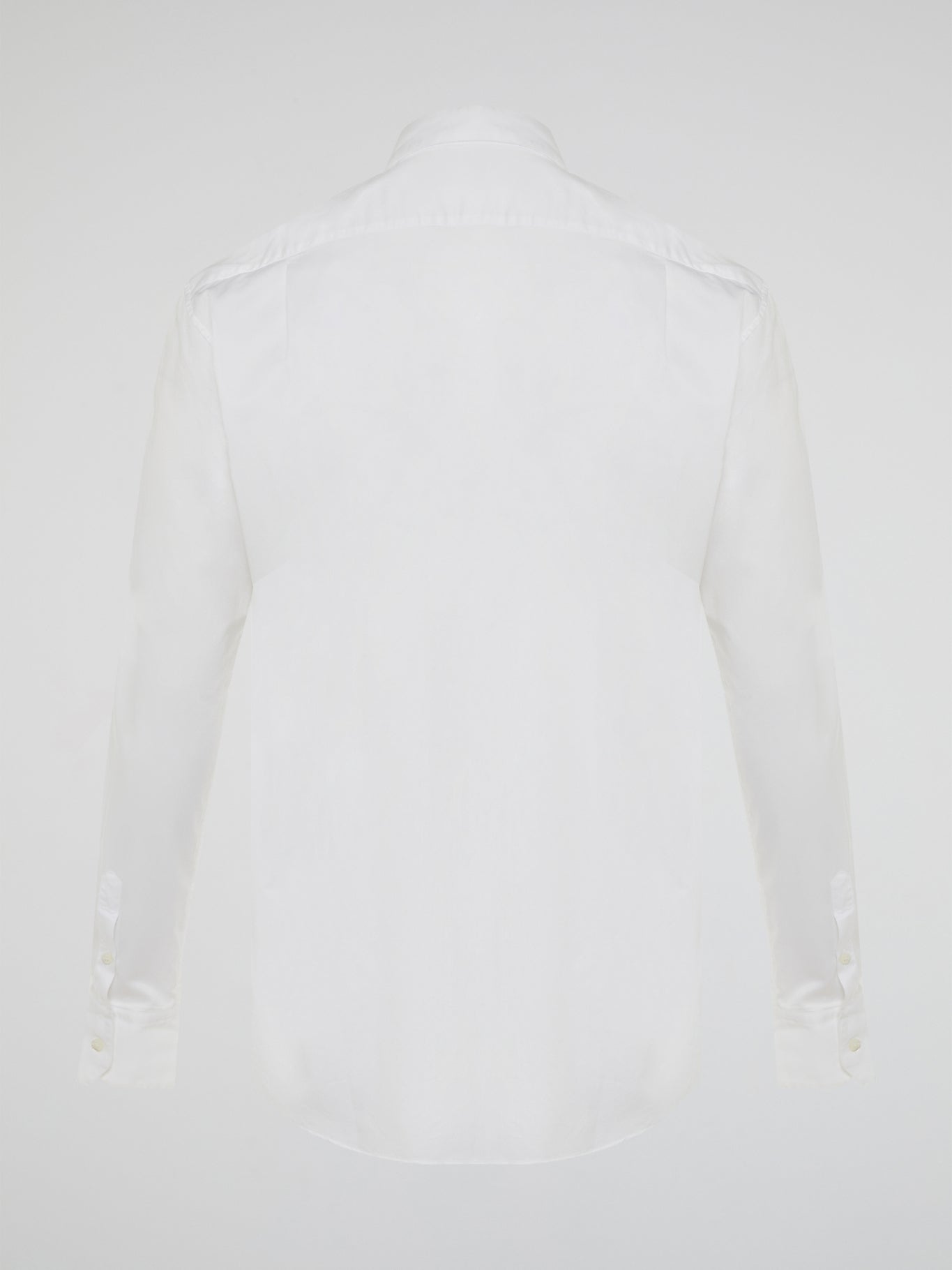 Step into a realm of elegance with the White Embroidered Shirt by Roberto Cavalli, where classic sophistication meets modern charm. Crafted with meticulous attention to detail, this shirt showcases exquisite floral embroidery that dances gracefully across the pristine white fabric. Embrace your inner fashion icon as you effortlessly blend timeless style with a touch of Italian flair, making a statement that is as timeless as it is enchanting.