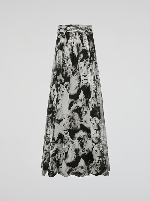 Step into the wild side with the Animal Print Pleated Maxi Dress by Roberto Cavalli. This captivating dress features a mesmerizing animal print pattern that embodies fierceness and elegance. Its pleated design effortlessly flows with every step, creating a striking silhouette that will make heads turn wherever you go.