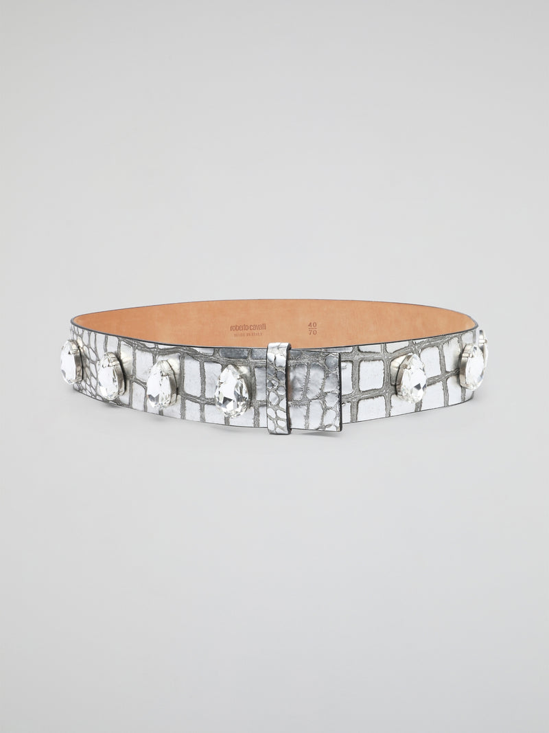 Be prepared to turn heads with the stunning Crystal Embellished Leather Belt by Roberto Cavalli. Crafted from luxurious leather, this belt features sparkling crystals that add a touch of glamour to any outfit. Elevate your style and make a statement with this eye-catching accessory that is sure to make you stand out in a crowd.