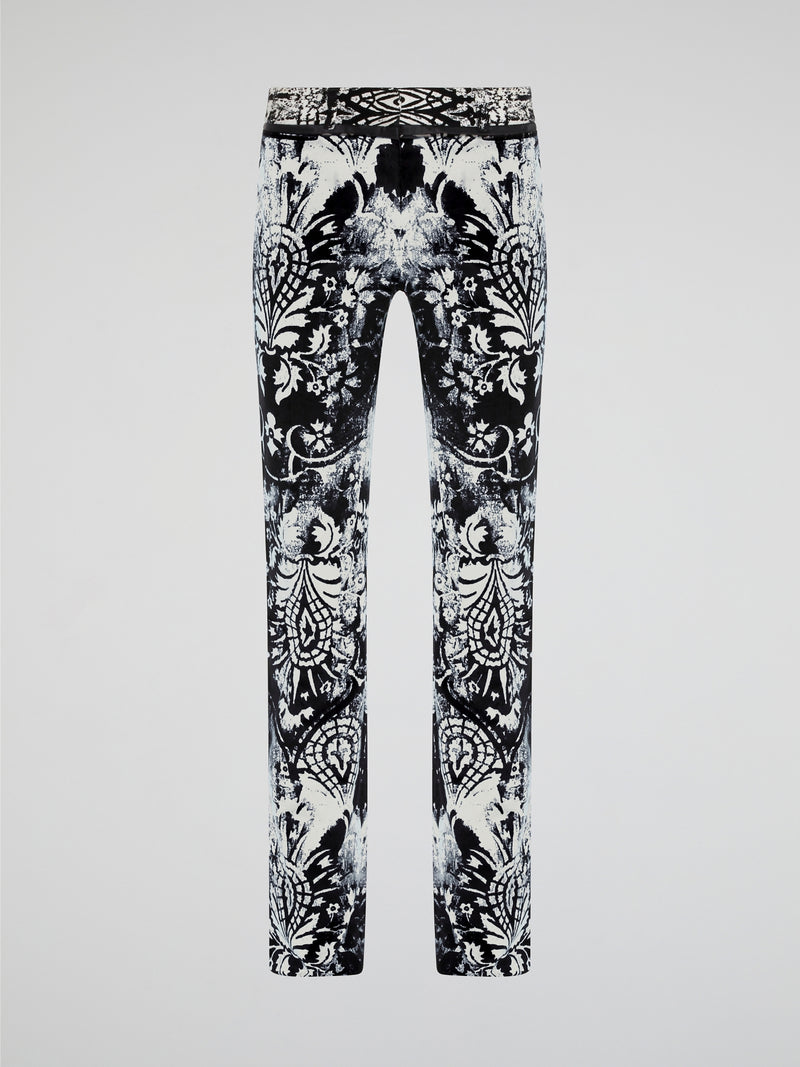 Elevate your wardrobe with our Roberto Cavalli Printed Skinny Trousers, designed to make a bold fashion statement. Crafted from luxurious fabrics and featuring a vibrant print, these trousers are the perfect combination of style and comfort. Whether you're heading to the office or a night out on the town, these trousers will ensure all eyes are on you.