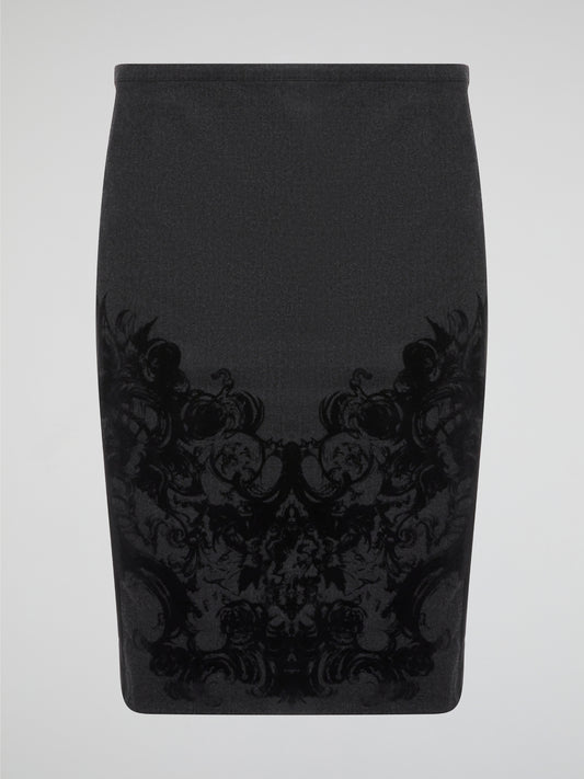 Elevate your office attire with this stunning grey printed pencil skirt from iconic designer Roberto Cavalli. The intricate pattern adds a touch of sophistication and style, making you stand out from the crowd. Pair it with a crisp white blouse and heels for a polished and fashion-forward look that will turn heads wherever you go.