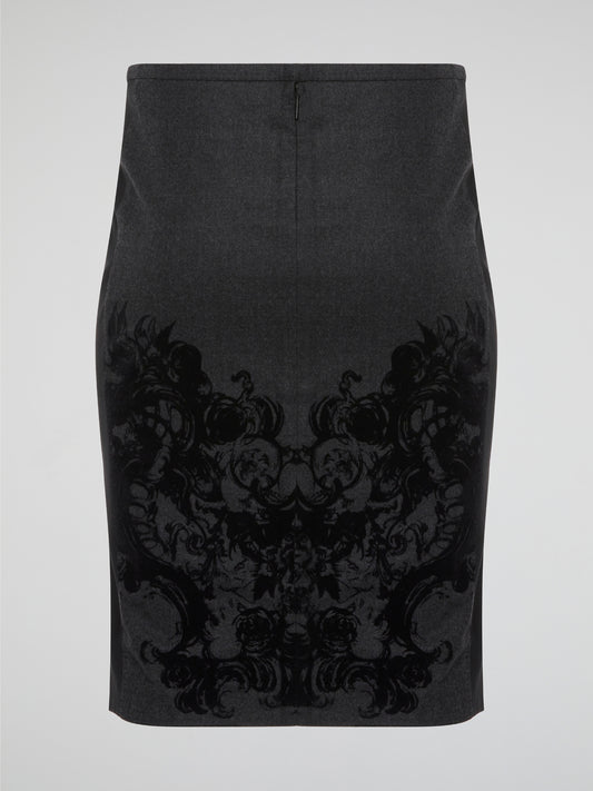 Elevate your office attire with this stunning grey printed pencil skirt from iconic designer Roberto Cavalli. The intricate pattern adds a touch of sophistication and style, making you stand out from the crowd. Pair it with a crisp white blouse and heels for a polished and fashion-forward look that will turn heads wherever you go.