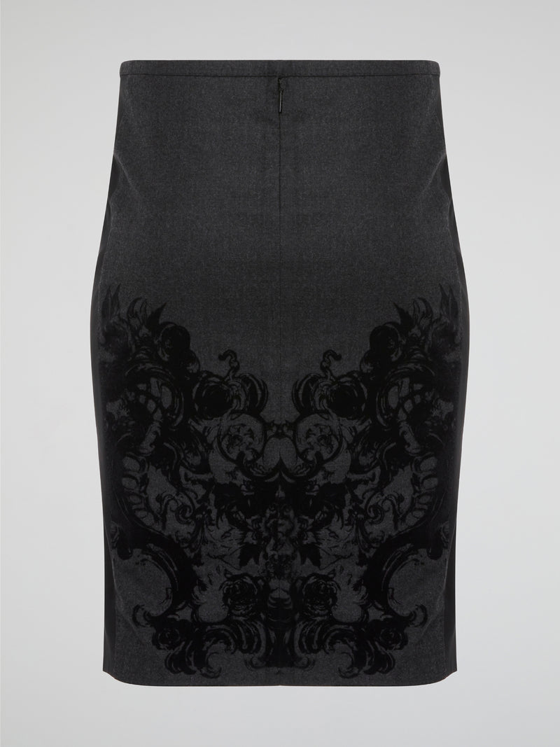 Elevate your office attire with this stunning grey printed pencil skirt from iconic designer Roberto Cavalli. The intricate pattern adds a touch of sophistication and style, making you stand out from the crowd. Pair it with a crisp white blouse and heels for a polished and fashion-forward look that will turn heads wherever you go.