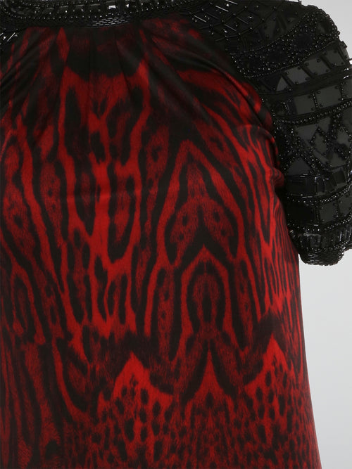 Make a fierce and bold statement with the Roberto Cavalli Leopard Print Embroidered Sleeve Dress. This stunning dress features intricate embroidery detailing on the sleeves, adding a touch of elegance to the edgy leopard print design. Stand out from the crowd and unleash your inner wild side with this show-stopping piece from Roberto Cavalli.