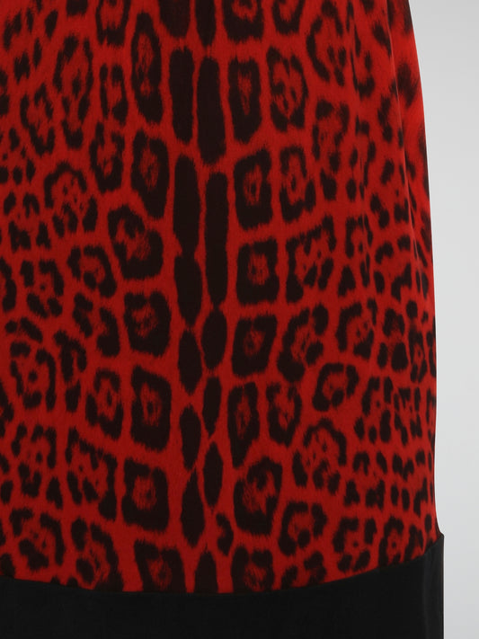 Step into the wild side with this fierce Red Leopard Print Shift Dress by Roberto Cavalli. Crafted from luxurious fabric, this dress is a statement piece perfect for any glamorous occasion. Embrace your inner fashionista and unleash your bold, confident style with this striking and stunning design.