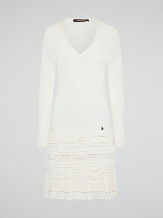 Elevate your winter wardrobe with the luxurious White Knitted Sweater Dress by Roberto Cavalli. This chic and sophisticated piece features intricate knit detailing and a flattering silhouette that will turn heads wherever you go. Whether you're dressing it up with heels for a night out or styling it casually with boots, this sweater dress is sure to make a statement.