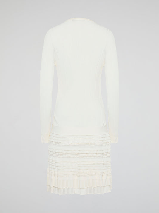 Elevate your winter wardrobe with the luxurious White Knitted Sweater Dress by Roberto Cavalli. This chic and sophisticated piece features intricate knit detailing and a flattering silhouette that will turn heads wherever you go. Whether you're dressing it up with heels for a night out or styling it casually with boots, this sweater dress is sure to make a statement.