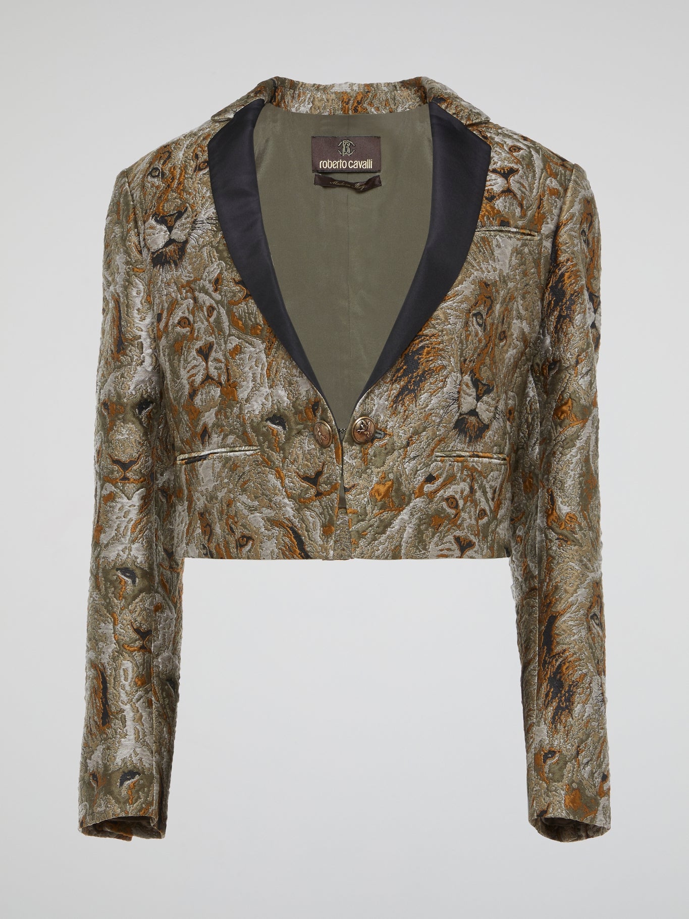 Release your inner lioness with this stunning Lion Print Cropped Blazer from Roberto Cavalli. Made from luxurious materials and featuring a bold, eye-catching lion print, this blazer is sure to make you stand out from the crowd. Pair it with your favorite jeans for a fierce and fashion-forward look that will turn heads wherever you go.