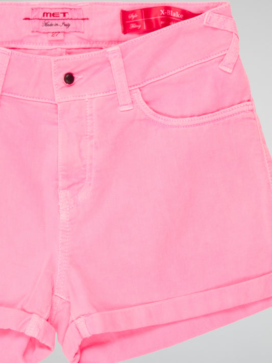 Rock the perfect blend of feminine and edgy with our Pink Denim Shorts by Met Injeans. Made from high-quality denim, these shorts feature a flattering high-rise waist and a trendy raw hem detail. Whether you're heading to a festival or a casual day out in the city, these shorts will elevate your style game effortlessly.