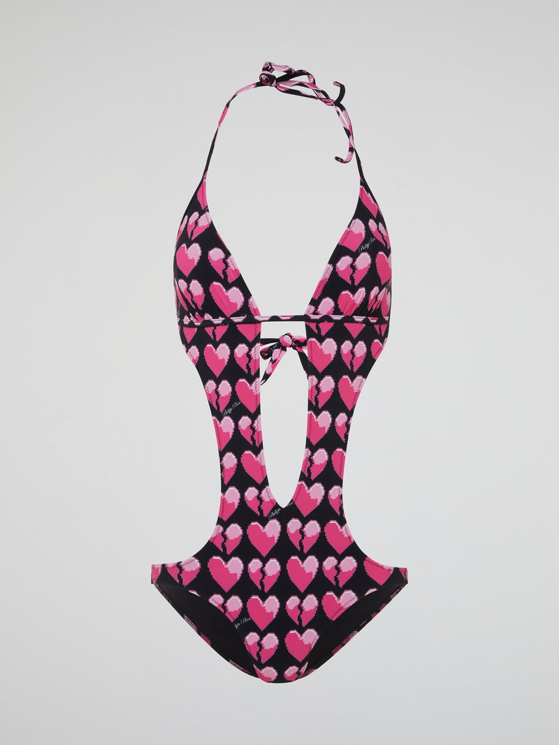 Dive into style with our Heart Print One-Piece Swimsuit by Philipp Plein, a perfect combination of chic and playful. Crafted with high-quality materials and a flattering silhouette, this swimsuit will be sure to turn heads at the beach or pool. Embrace your inner fashionista and make a statement with this must-have summer essential.