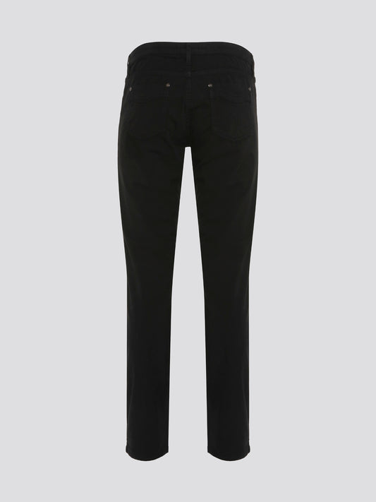 Step out in style with these sleek and versatile Black Skinny Fit Jeans from Roberto Cavalli. Made from premium quality denim, these jeans hug your curves in all the right places while offering unbeatable comfort. Whether dressed up with heels or down with sneakers, these jeans are a must-have for any fashion-forward wardrobe.