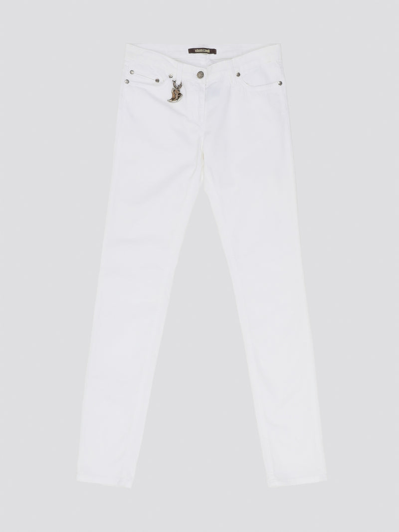 Indulge in timeless elegance and modern sophistication with these White Straight Leg Jeans by Roberto Cavalli. Crafted with precision and attention to detail, these jeans feature a sleek silhouette that effortlessly complements any ensemble. Elevate your everyday wardrobe with a touch of luxury and style with these iconic Roberto Cavalli jeans.