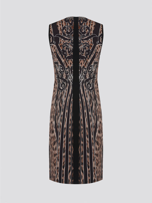 Fade into the wild with the Roberto Cavalli Leopard Print Sheath Dress. This fierce and fabulous statement piece will turn heads wherever you go, exuding confidence and sophistication. Embrace your inner predator and unleash your stylish prowess with this bold and daring dress.