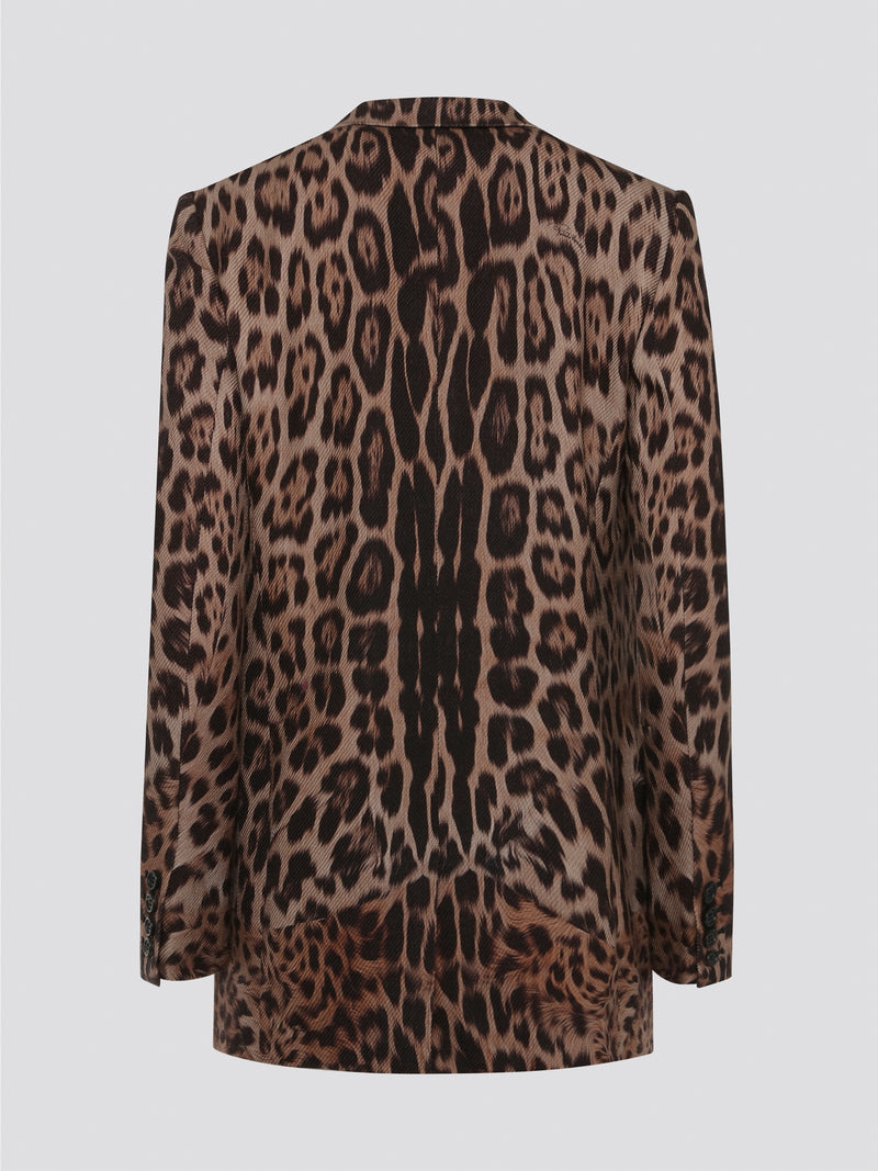 Elevate your wardrobe with the fierce and fabulous Leopard Print Blazer from Roberto Cavalli. This statement piece is perfect for adding a touch of wild sophistication to any ensemble. Embrace your inner style predator and unleash your confidence in this stunning blazer.