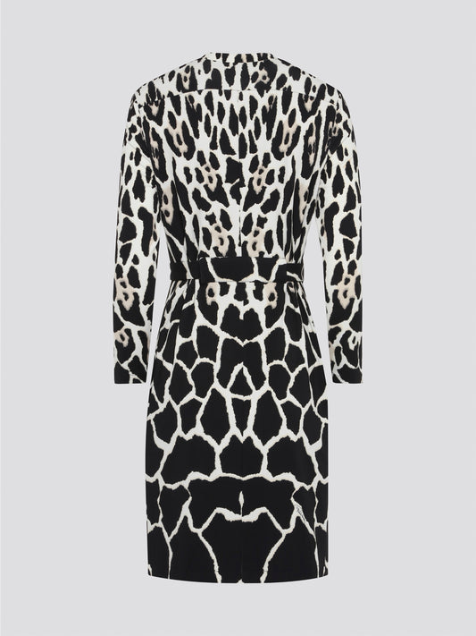 Unleash your wild side with our Roberto Cavalli Leopard Print Wrap Dress! This fierce and fabulous piece is designed to make a statement, with its bold print and flattering wrap silhouette. Whether you're hitting the town with friends or strutting your stuff at a special event, this dress is guaranteed to turn heads and have all eyes on you.