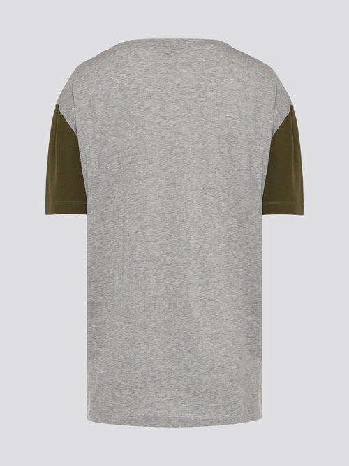 Elevate your casual wardrobe with the sleek and sophisticated Grey Logo Print V-Neck T-Shirt from Roberto Cavalli. Made from premium cotton for ultimate comfort and durability, this shirt features a bold logo print for a touch of luxury. Pair it with jeans for a stylish and effortlessly cool look that is sure to turn heads.