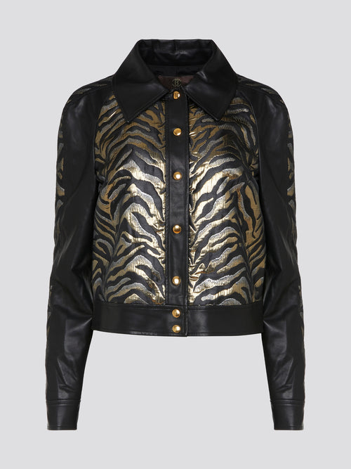 Add a fierce touch to your wardrobe with this stunning tiger print leather jacket by Roberto Cavalli. Crafted from premium leather and featuring a bold tiger print design, this jacket is sure to make a statement wherever you go. Whether you're dressing up a casual outfit or adding an edge to a night out look, this jacket is the perfect way to showcase your wild side.