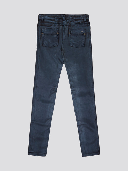 Elevate your denim game with these sleek Navy Slim Fit Jeans by Roberto Cavalli, perfect for the modern man who values style and sophistication. Crafted from high-quality denim with a hint of stretch, these jeans provide a comfortable and flattering fit that will keep you looking sharp all day long. Pair them with a crisp white shirt and sneakers for a laid-back yet polished ensemble that will turn heads wherever you go.