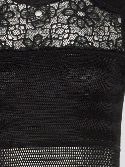 Indulge in the perfect blend of elegance and allure with our Black Lace Panel Mini Dress by Roberto Cavalli. This stunning piece features intricate lace detailing that highlights your curves, while the mini length adds a touch of sass to your look. Whether you're hitting the town or attending a special event, this dress is sure to turn heads and make you feel like a true fashionista.