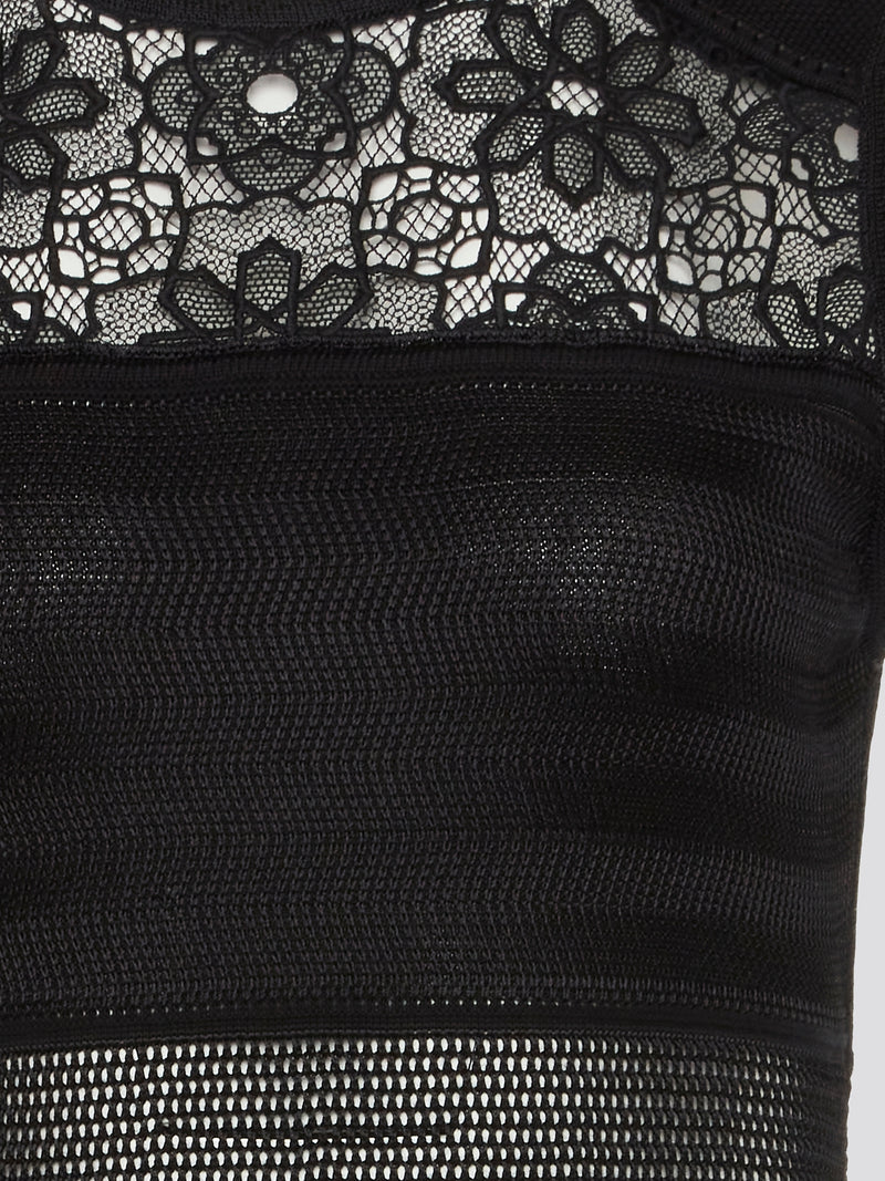 Indulge in the perfect blend of elegance and allure with our Black Lace Panel Mini Dress by Roberto Cavalli. This stunning piece features intricate lace detailing that highlights your curves, while the mini length adds a touch of sass to your look. Whether you're hitting the town or attending a special event, this dress is sure to turn heads and make you feel like a true fashionista.